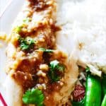 Easy Thai Steamed Tilapia with Spicy Tamarind Sauce: Super quick week night meal that tastes like it's from a nice Thai restaurant full of flavors like tangy tamarind, spicy Thai chili pepper and melt in your mouth fish? Yes please! | thai-foodie.com