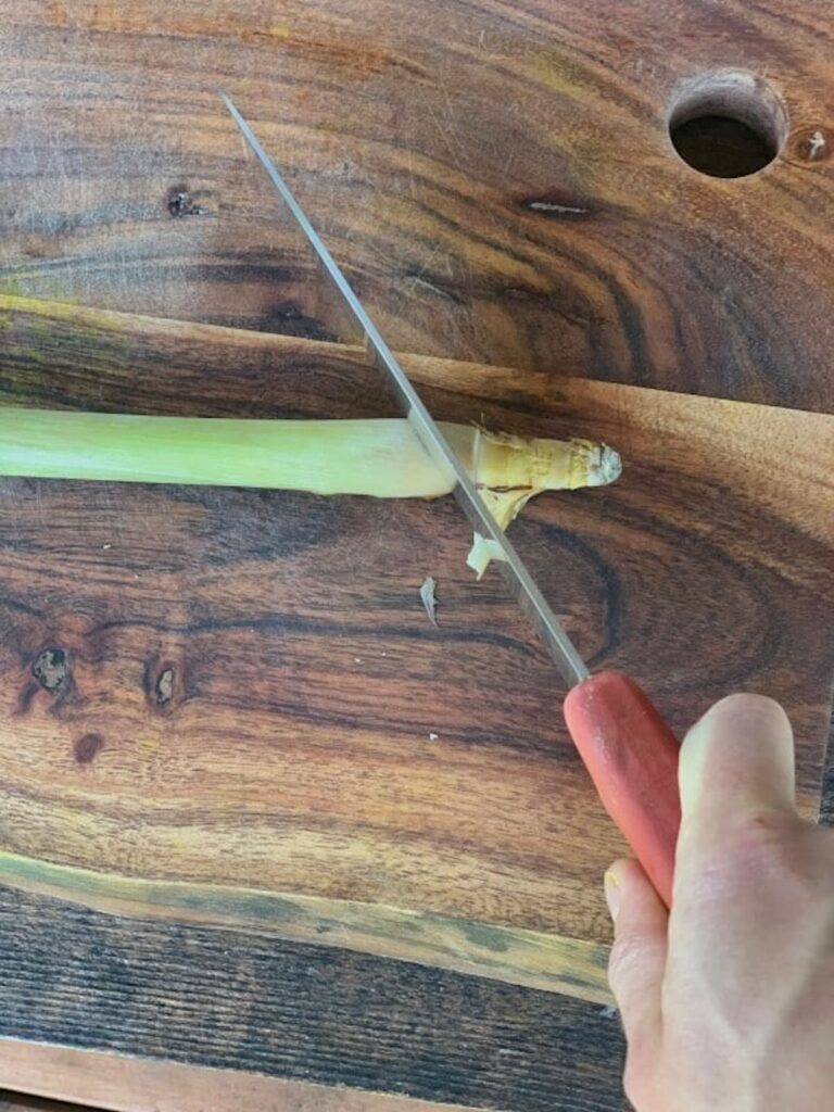 Cutting lemongrass.