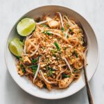 pad thai chicken plated fork